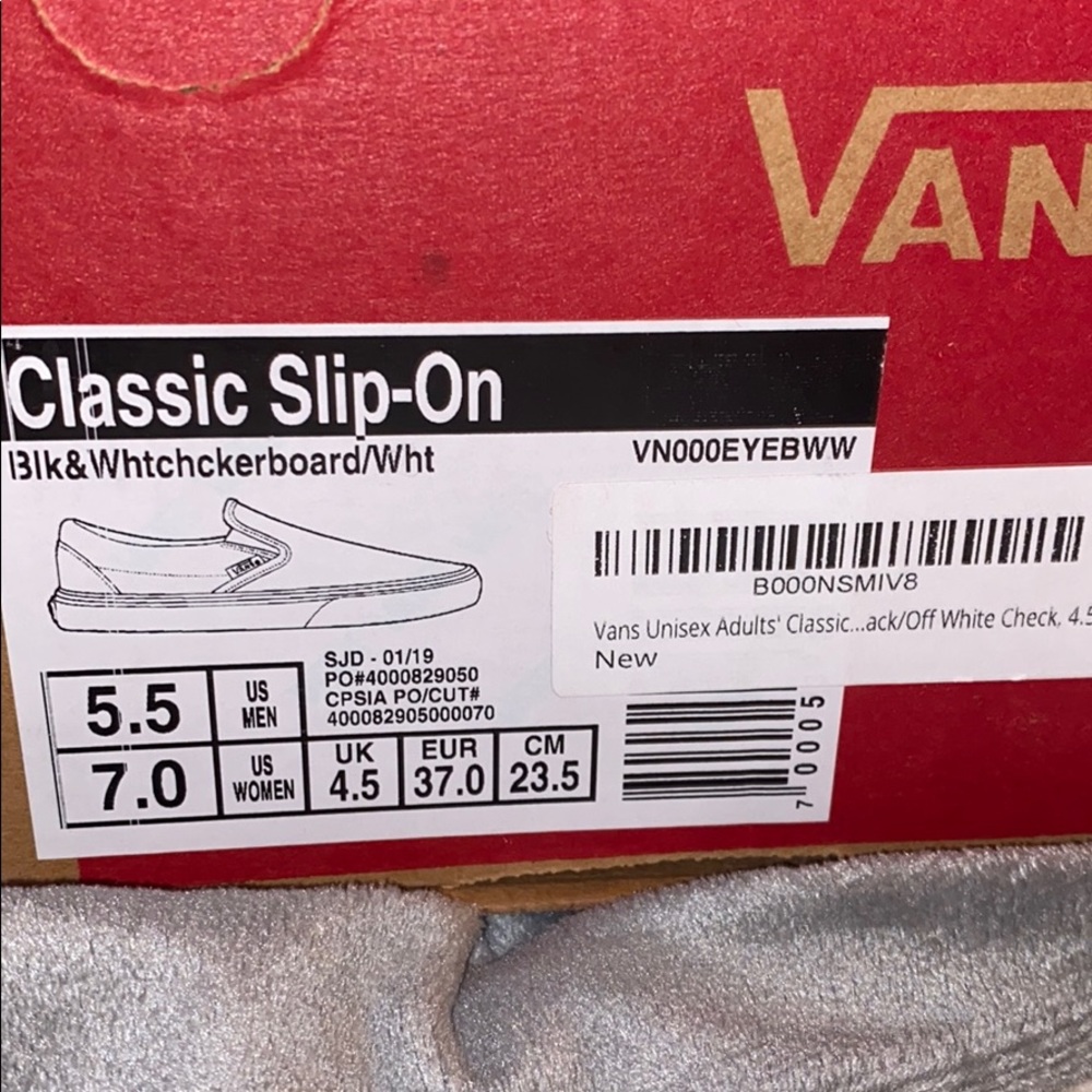 Slip on black and white checkered vans